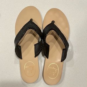 Black  Sandals with whip stitching detail.